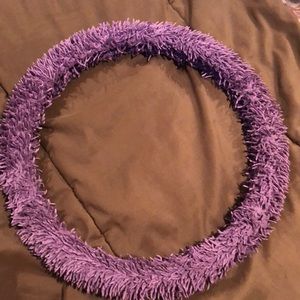 Purple fuzzy steering wheel cover